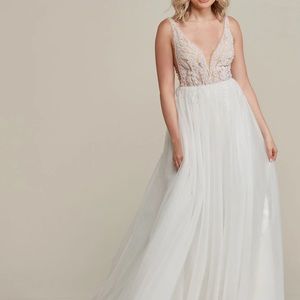 Nude and ivory beaded, tulle wedding gown.